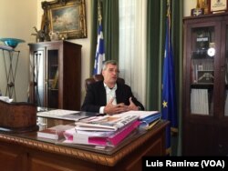 Lesbos Mayor Spyros Galinos told VOA Sunday: “Today, Europe is at a crossroads. One way it leads to an enlightened Europe of hope, of peace, of solidarity, one that defends human values and the other to a dark, Fascist past."