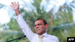 L'ancien président des Maldives Mohamed Nasheed fait un discours à son retour d'exil aux Maldives, à Malé, le 18 novembre 2018.