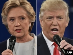 This combination of pictures created on October 09, 2016 shows Democratic presidential candidate Hillary Clinton and Republican presidential candidate Donald Trump during the second presidential debate at Washington University in St. Louis, Missouri.