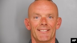 FILE - This undated file photo provided by the Fox Lake Police Department shows Lt. Charles Joseph Gliniewicz. 