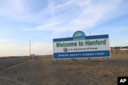 A sign welcomes drivers to Hanford Nuclear Reservation in Benton County, May 9, 2017, in Richland, Washington.