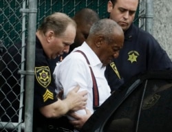 FILE - Bill Cosby departs after his sentencing hearing at the Montgomery County Courthouse, Sept. 25, 2018, in Norristown, Pennsylvania.
