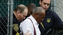 FILE - Bill Cosby departs after his sentencing hearing at the Montgomery County Courthouse, Sept. 25, 2018, in Norristown, Pennsylvania.