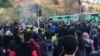 یکی از دهها تجمع معترضان در ایران در ابتدای دی ماه امسال