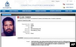 FILE - This Sept. 22, 2016, screen grab from the Interpol wanted persons web page shows a red notice for Fabien Clain.