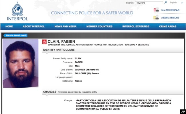 FILE - This Sept. 22, 2016, screen grab from the Interpol wanted persons web page shows a red notice for Fabien Clain.