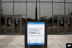 The Smithsonian Institution National Air and Space Museum is seen shuttered during the partial government shutdown, Jan. 4, 2019, in Washington.