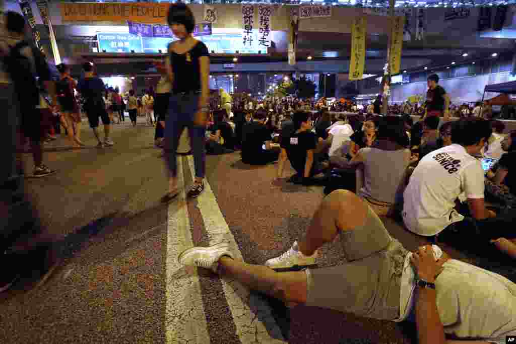 Student pro-democracy protesters continue to occupy the streets around government headquarters in Hong Kong, Oct. 5, 2014.