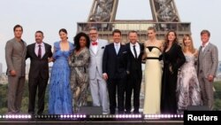 Director Christopher McQuarrie, cast members Tom Cruise, Henry Cavill, Simon Pegg, Rebecca Ferguson, Angela Bassett, Michelle Monaghan, Vanessa Kirby, Alix Benezech, Caspar Phillipson, and producer Jake Myers pose during the world premiere of the film "Mission: Impossible - Fallout" in Paris, France, July 12, 2018.