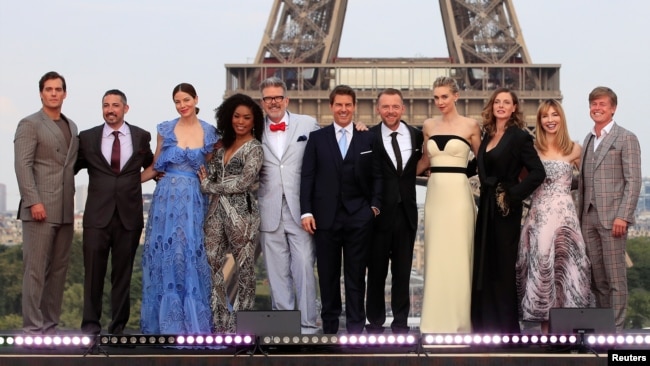 Director Christopher McQuarrie, cast members Tom Cruise, Henry Cavill, Simon Pegg, Rebecca Ferguson, Angela Bassett, Michelle Monaghan, Vanessa Kirby, Alix Benezech, Caspar Phillipson, and producer Jake Myers pose during the world premiere of the film "Mission: Impossible - Fallout" in Paris, France, July 12, 2018.