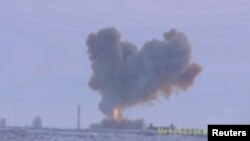 A still image taken from a video footage and released by Russia's Defense Ministry, Dec. 26, 2018, shows a test launch of an Avangard new hypersonic missile in Orenburg Region.