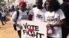 Des manifestants appellent à des élections pacifiques au Nigéria à Abuja, le 6 février 2019. (VOA/G. Alheri)