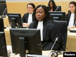 FILE - ICC chief prosecutor Fatou Bensouda looks on during the case against Congolese militia leader Bosco Ntaganda [not shown] at the International Criminal Court in The Hague, February 2014.