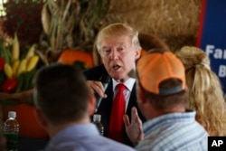 Republican presidential candidate Donald Trump speaks during a meeting with local farmers at Bedners Farm Fresh Market in Boynton Beach, Florida, Oct. 24, 2016.