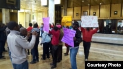 Protesters outside the Five Star Rainbow Hotel where Vice President, Phelekezela Mphoko, has domiciled for almost two years.