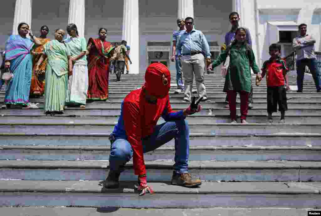 Gaurav Sharma, an independent candidate also known as the Indian Spider Man, arrives to file his nomination for the upcoming general election in Mumbai. India will hold its general election in nine stages staggered between April 7 and May 12.