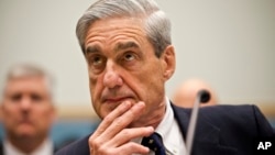 Then-FBI Director Robert Mueller testifies on Capitol Hill in Washington, June 13, 2013.
