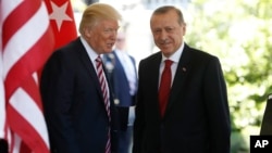 President Donald Trump welcomes Turkish President Recep Tayyip Erdogan to the White House in Washington, May 16, 2017. 