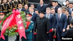 North Korean leader Kim Jong Un arrives for a wreath laying ceremony at a navy memorial in Vladivostok, Russia, April 26, 2019. 