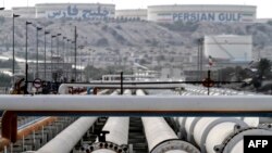 FILE - A picture shows export oil pipelines at an oil facility in Iran's Kharg Island, on the shore of the Persian Gulf, Feb. 23, 2016.