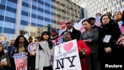 Haitian immigrants and supporters rally to reject DHS Decision to terminate TPS for Haitians, at the Manhattan borough in New York, U.S., November 21, 2017. REUTERS/Eduardo Munoz - RC1ABB9C78E0