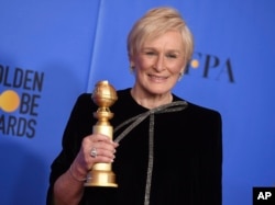Glenn Close poses in the press room with the award for best performance by an actress in a motion picture, drama for "The Wife" at the 76th annual Golden Globe Awards