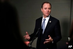 FILE - Rep. Adam Schiff, D-Calif., ranking member of the House Intelligence Committee, speaks to the media after attending a closed meeting with testimony by Attorney General Jeff Sessions, Nov. 30, 2017, on Capitol Hill in Washington.