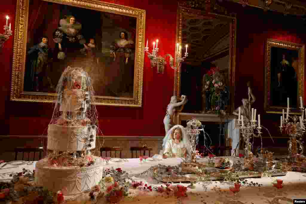 Carole Copeland poses as the character Miss Havisham during the Dickens themed annual Christmas event at Chatsworth House near Bakewell in Britain.