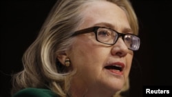 U.S. Secretary of State Hillary Clinton testifies during a hearing held by the U.S. Senate Foreign Relations Committee on Capitol Hill in Washington, January 23, 2013. 