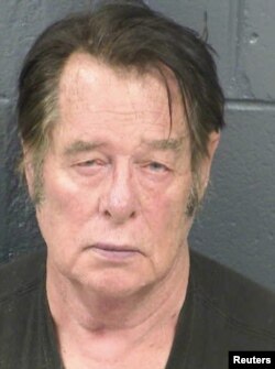 Larry Hopkins appears in a police booking photo taken at the Dona Ana County Detention Center in Las Cruces, New Mexico, April 20, 2019.