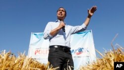 Democratic presidential candidate Julian Castro speaks at the Des Moines Register Soapbox during a visit to the Iowa State Fair, Friday, Aug. 9, 2019, in Des Moines, Iowa. (AP Photo/Charlie Neibergall)