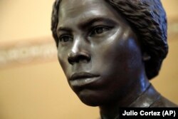 A bronze statue of abolitionist Harriet Tubman is seen during a private viewing ahead of its unveiling at the Maryland State House, Monday, February 10, 2020, in Annapolis.