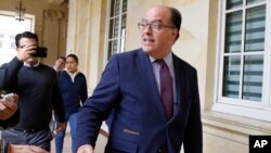 Julio Borges, president of the Venezuelan parliament, arrives for a meeting with Ernesto Macias, president of Colombia's Senate, at the Congress in Bogota, Colombia, Aug. 8, 2018.