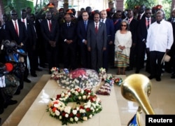 South Sudan President Salva Kiir, Sudan's President Omar al-Bashir, Somalia's President Mohamed Abdullahi Mohamed, Ethiopian President Sahle-Work Zewde, and Uganda's President Yoweri Museveni pay their respects to the late Sudanese liberation hero John Garang at the John Garang's Mausoleum in Juba, South Sudan October 31, 2018.