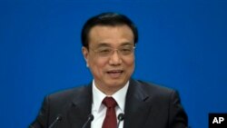 Perdana Menteri baru China, Li Keqiang dalan konferensi pers seusai Kongres Partai Nasional di Beijing (17/3).