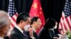 中共政治局委员杨洁篪（中）和中国外长王毅在阿拉斯加美中高层会谈上。（2021年3月18日） 