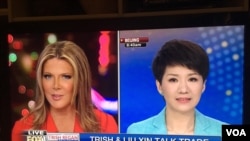 Trish Regan of Fox Business Network and Liu Xin of China's CGTN debate on U.S.-China trade issues, May 29, 2019.