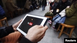 FILE: Sites such as YouTube help make video the dominant force in U.S. Internet consumption, a new Cisco Systems report finds. 