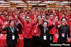 Ketua Umum PDI Perjuangan Megawati Soekarnoputri mengumumkan penetapan Jokowi sebagai calon presiden 2019-2024 di Rakernas PDI P Bali Jumat 23 Februari 2018. (Foto: Biro Pers Istana)