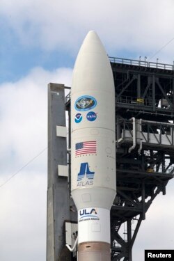 The upper stage and payload fairing containing the Geostationary Operational Environmental Satellite-Series R (GOES-R) on a United Launch Alliance Atlas V rocket is shown at Space Launch Complex 41 at Cape Canaveral Air Force Station in Florida, Nov. 18,