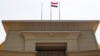 FILE - The Egyptian flag is seen atop the Supreme Constitutional Court building in Cairo in this July 4, 2013, file photo.