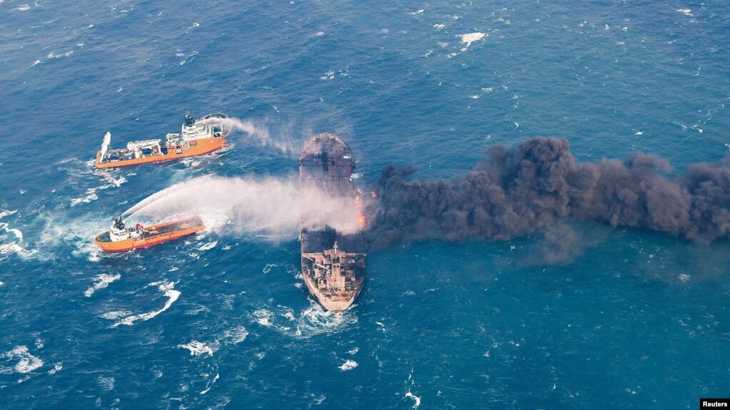 Winds push burning Iranian tanker into Japanese waters, more than 30 still missing (voanews.com)