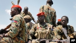 FILE - South Sudanese government soldiers, shown in an October 2016 photo, and local police repulsed an early morning assault on Yambio, Nov. 10, 2016.