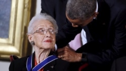 U.S. President Barack Obama presents the Presidential Medal of Freedom to NASA mathematician Katherine G. Johnson during an event in the East Room of the White House in Washington November 24, 2015.