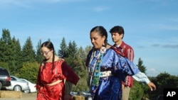 The Colville tribe in Washington State is considering a plan to relax the blood requirement in its tribal constitution so that more children of mixed marriages can become members.