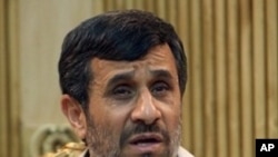 Iranian President Mahmoud Ahmadinejad speaks to the press prior leaving to the United States at Tehran's Mehrabad Airport, 02 May 2010