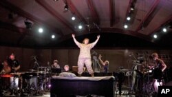 Soprano Dawn Upshaw, portraying a US soldier returning from Afghanistan, rehearses 'Winds of Destiny' at the Ojai Music Festival in California.