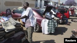 Hawkers sell goods on the streets of Zimbabwe's capital Harare.