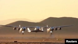 Virgin Galactic's carrier airplane WhiteKnightTwo carrying a space tourism rocket plane SpaceShipTwo takes off from Mojave Air and Space Port in Mojave, California, U.S. in a still image from video December 13, 2018.