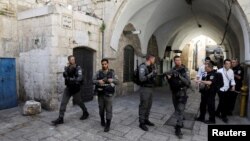  Israeli border police secure the area near the scene of the shooting attack in Jerusalem's Old City, July 14, 2017.